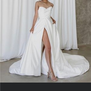 Wedding gown with pockets and slit